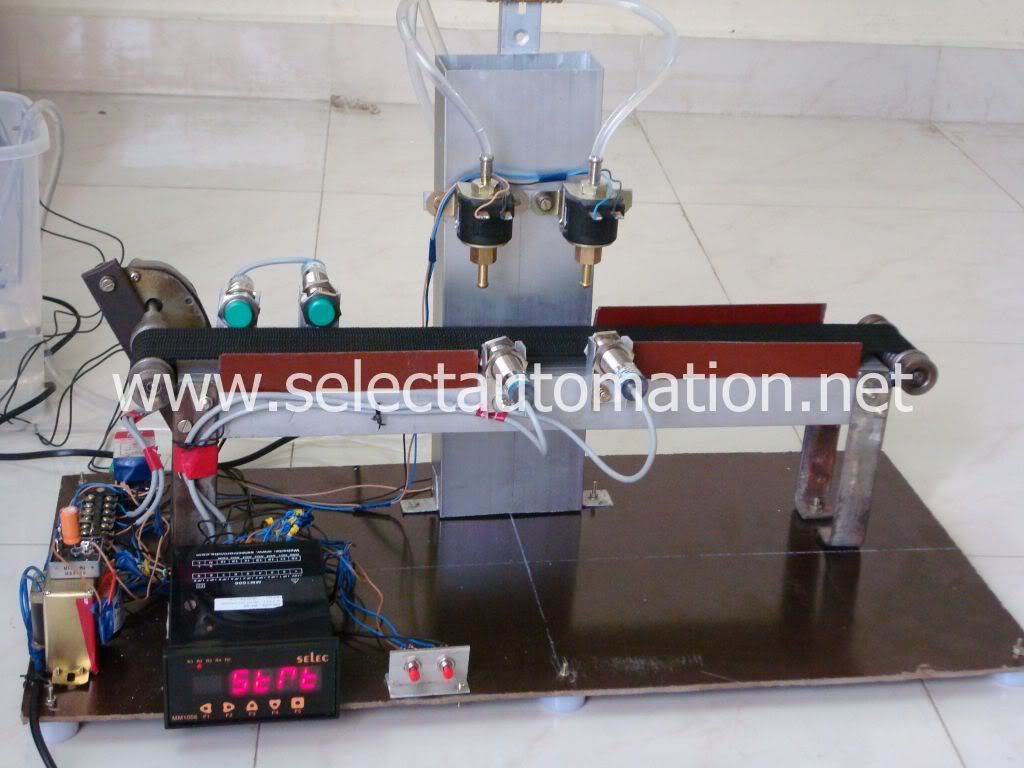 Automatic Bottle Filling Machine Using PLC Photo by selectautomation1